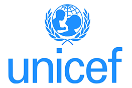 The UNICEF logo - an adult and child in front of a blue globe surrounded by a wreath, on top of the blue text 'unicef'.