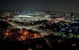 Birds-eye view of sports stadium at night